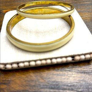 194.  Gold and Cream Bangle Bracelets